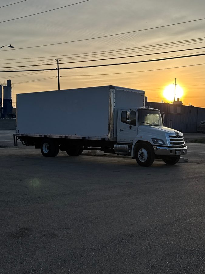 Straight truck at sunset