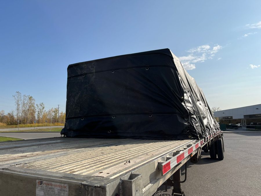 Flatbed trailer with tarped freight